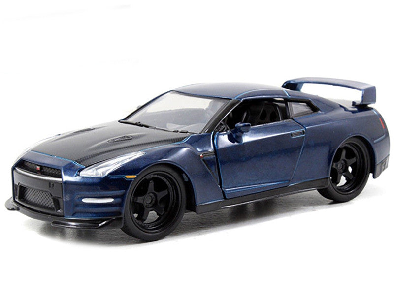 Model car of a blue sports car on a white background