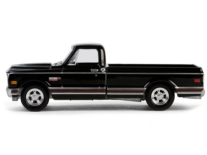 Black pickup truck on a white background
