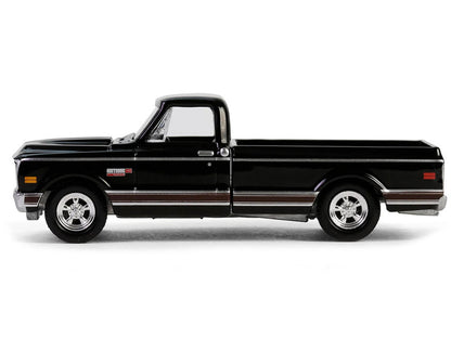 Black pickup truck on a white background