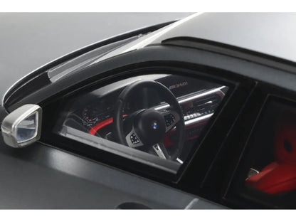 Car dashboard with steering wheel and instrument cluster on a gray background