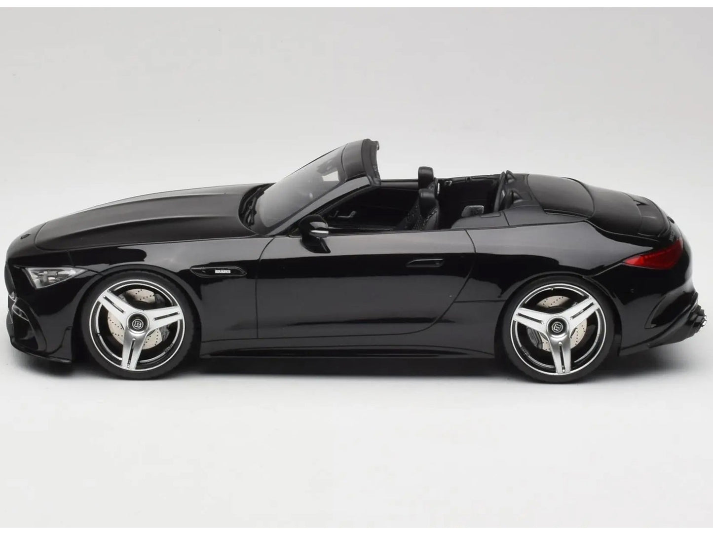 Side view of a black toy car