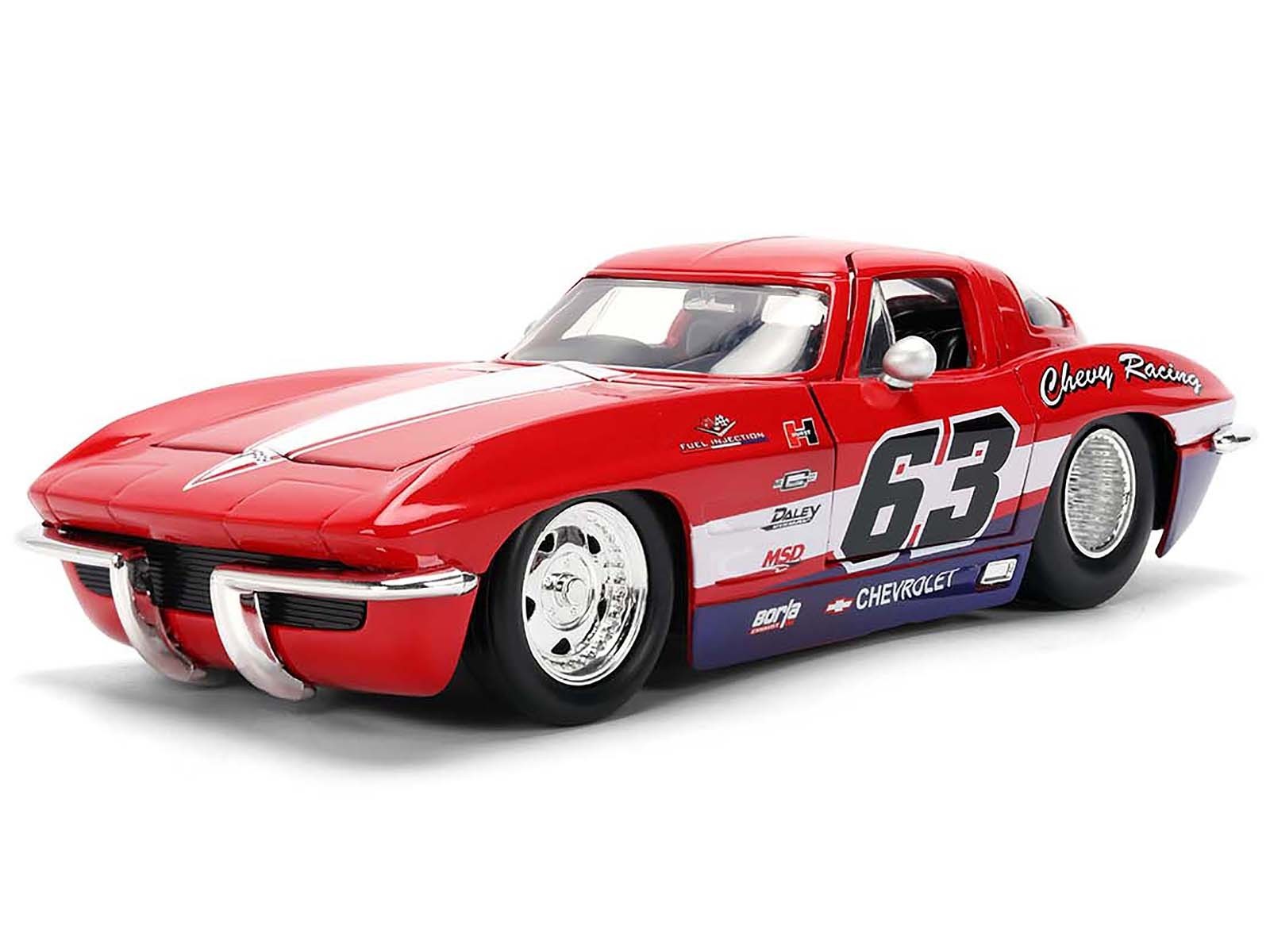 Red and white model car with racing decals on a white background