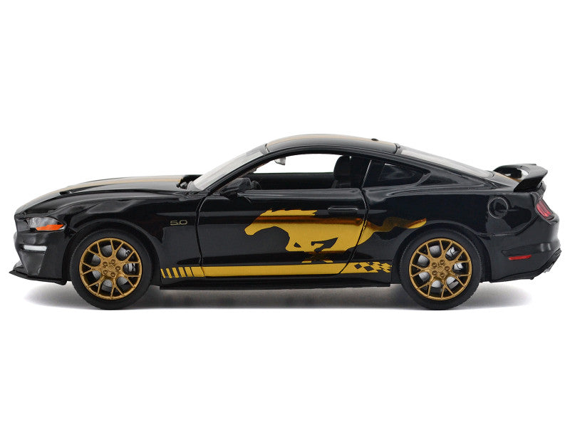 Black car with yellow stripes on a white background