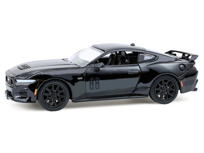 Black sports car model on a white background