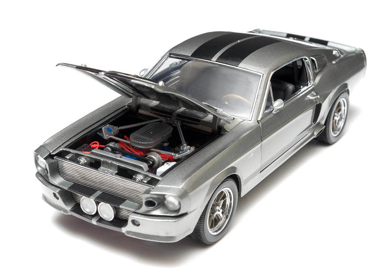 Model car with open hood on a white background