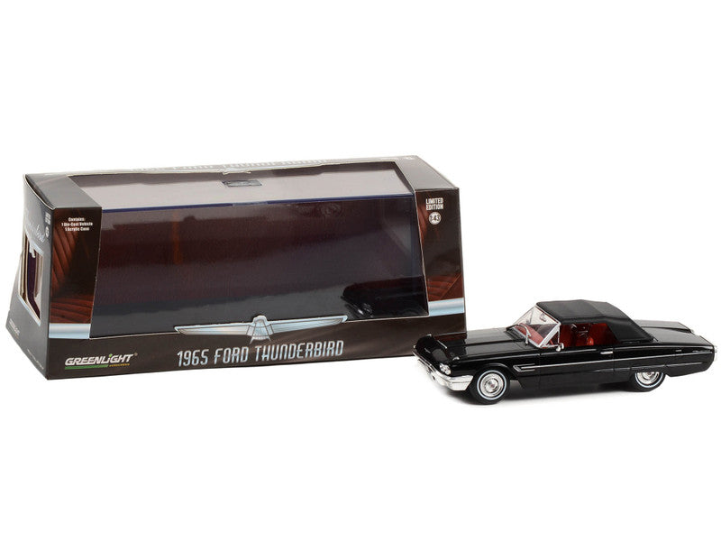 1965 Ford Thunderbird model car with packaging on a white background