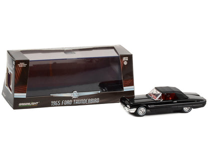1965 Ford Thunderbird model car with packaging on a white background