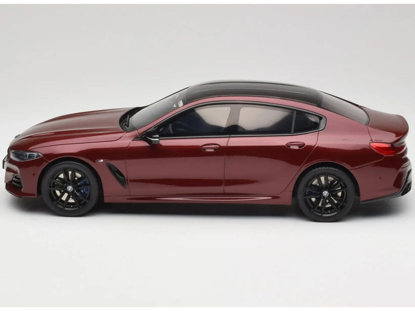 Red sports car on a white background