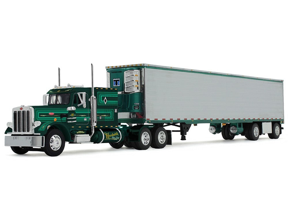 Model of a green semi-truck with a trailer on a white background
