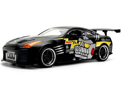 Black toy car with colorful graphics on a white background