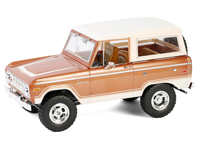 Model of a vintage SUV with a brown body and white roof on a white background