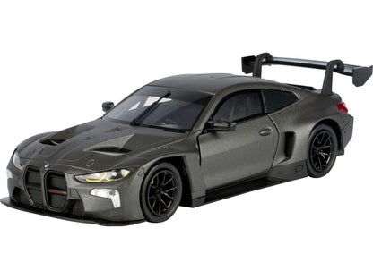 Model of a sports car with a large rear wing on a white background