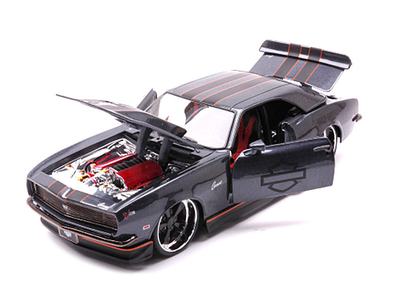 Model car with open hood on a white background