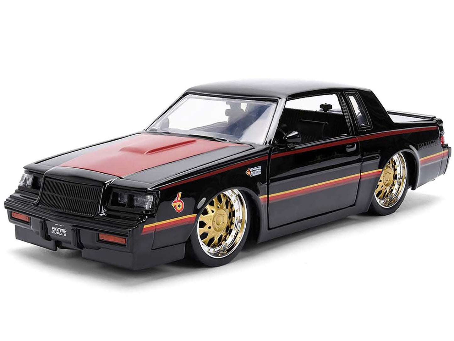 Model car with black and red design on a white background