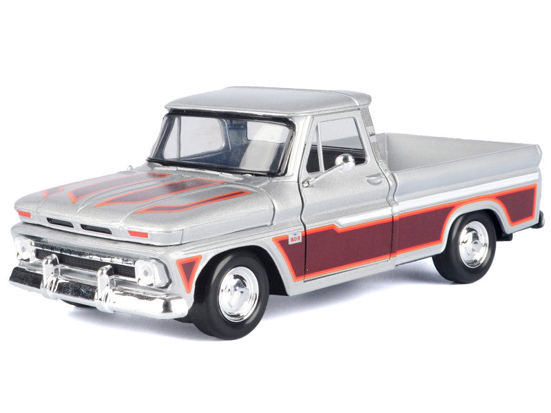 Model of a classic pickup truck with a silver and red design on a white background