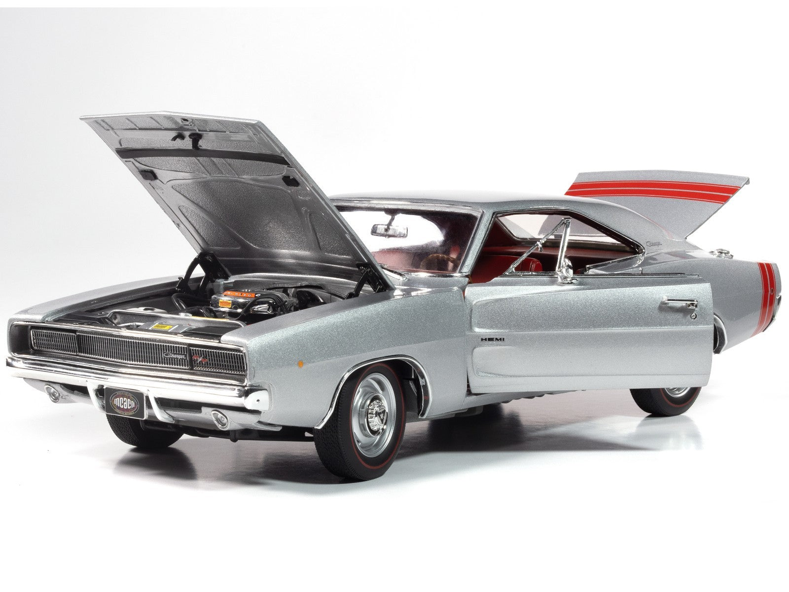 Model of a classic car with an open hood on a white background