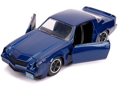 Doors open on a blue muscle car