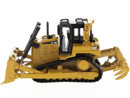 Toy bulldozer with detailed features on a white background