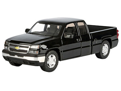 Black Chevrolet truck model on a white background
