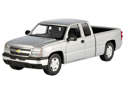 Model of a silver Chevrolet truck on a white background