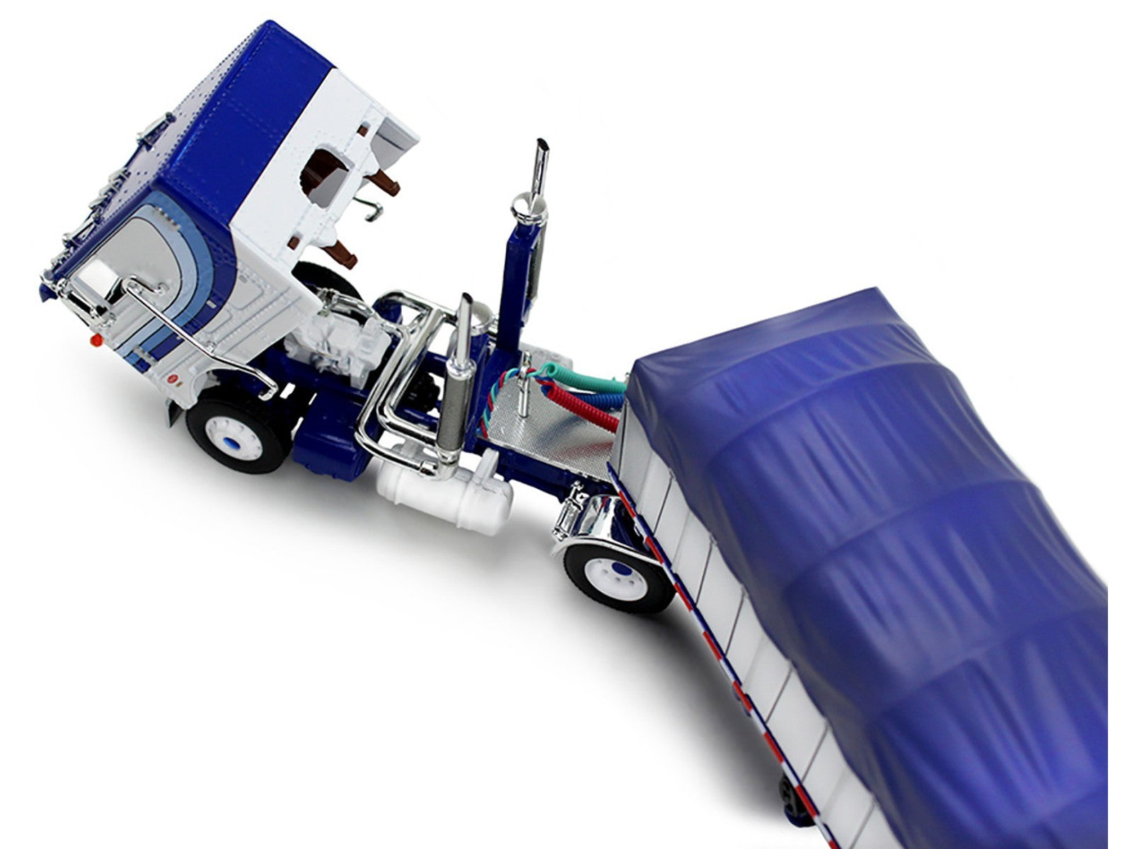 Model of a blue and white truck with a trailer on a white background