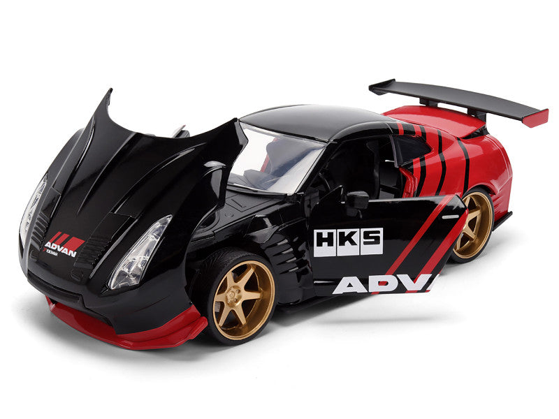 Model car with black and red design on a white background