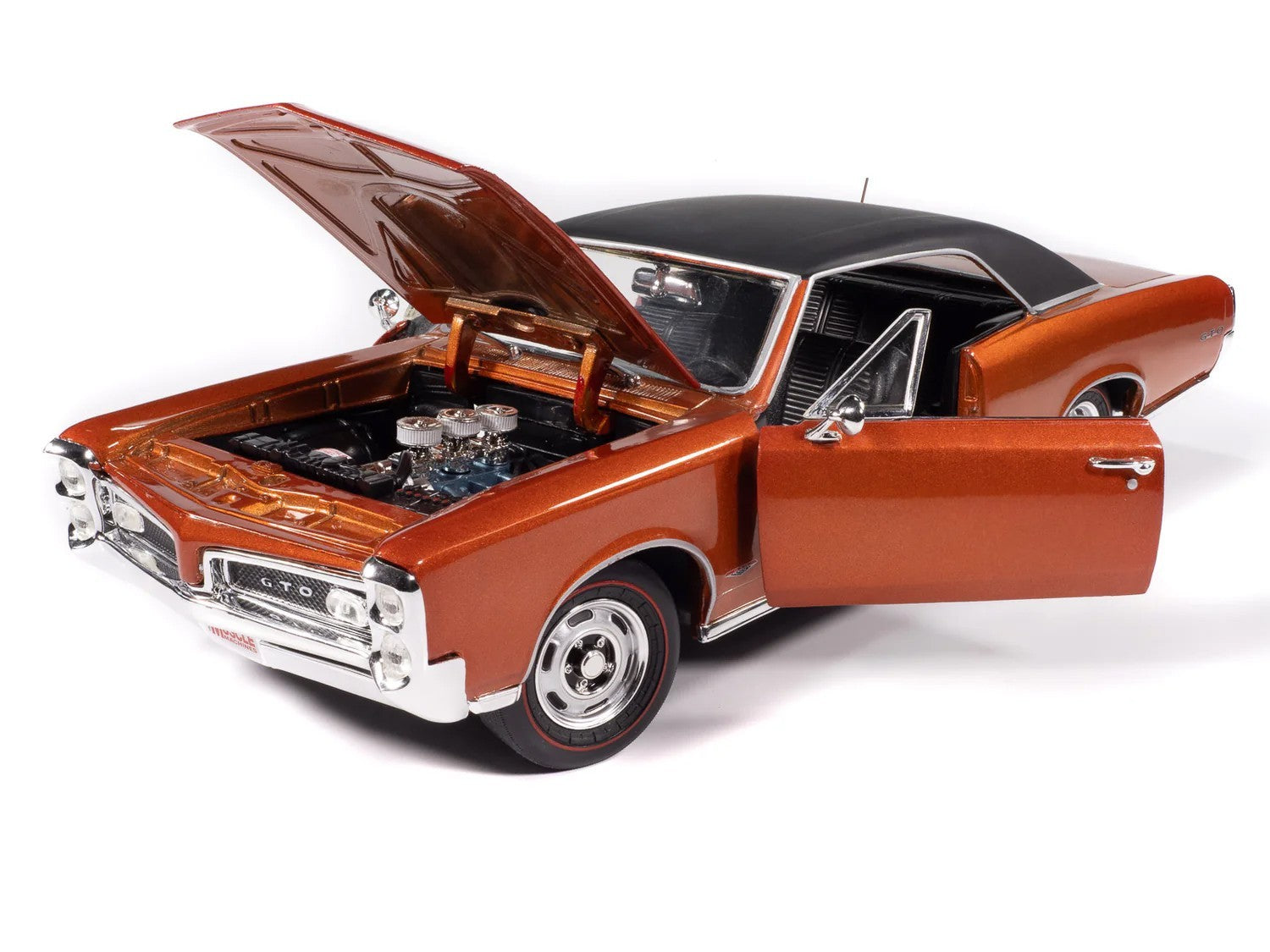 Model car with open hood and door on a white background