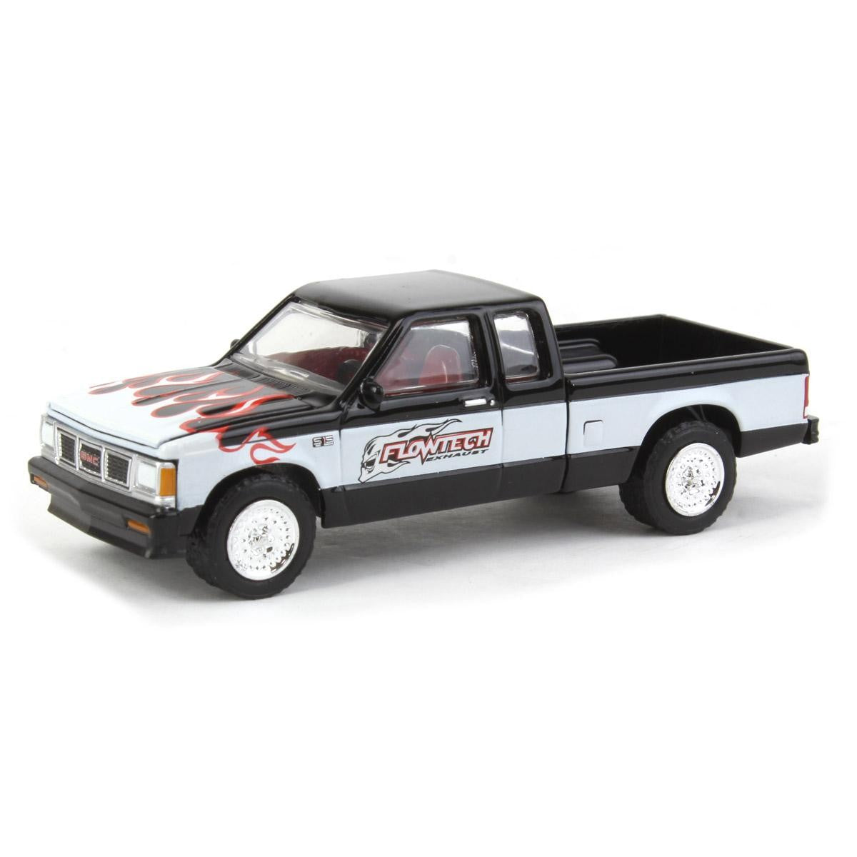 Model truck with Flowtech branding on a white background