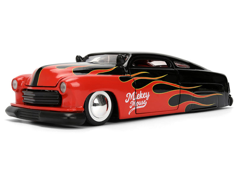 Model car with flame design and 'Mickey Mouse' branding on a white background