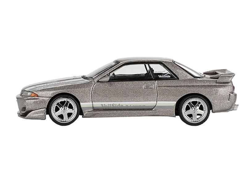 Model car of a Nissan Skyline on a white background