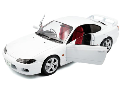 White model car with open doors on a white background