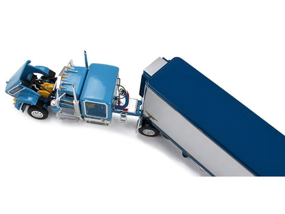 Model of a blue truck with a trailer on a white background