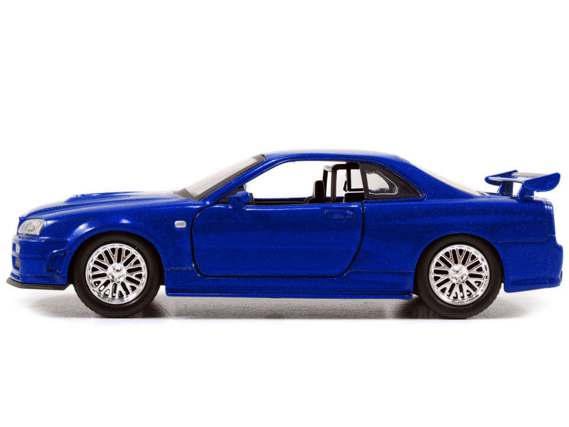 Blue toy car on a white background