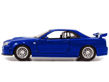 Blue toy car on a white background
