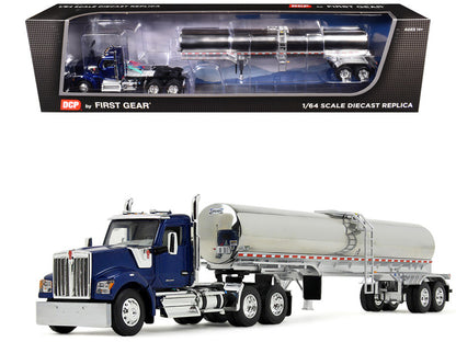 Model truck with a silver tanker trailer in front of its packaging