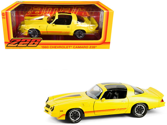 Yellow 1980 Chevrolet Camaro Z28 model car in a red and orange box with 'Z28' branding.
