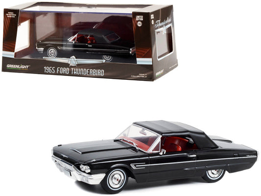 1965 Ford Thunderbird model car in black with packaging on a white background