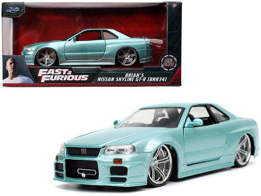 Light blue model car of Brian's Nissan Skyline GT-R from 'Fast & Furious' in packaging.