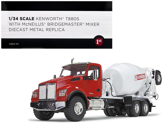 A 1/34 scale diecast metal replica of a Kenworth T880S truck with McNeilus Bridgemaster mixer in red and white colors.