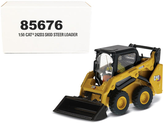 Model of a Caterpillar skid steer loader with model number 85676 on a white background