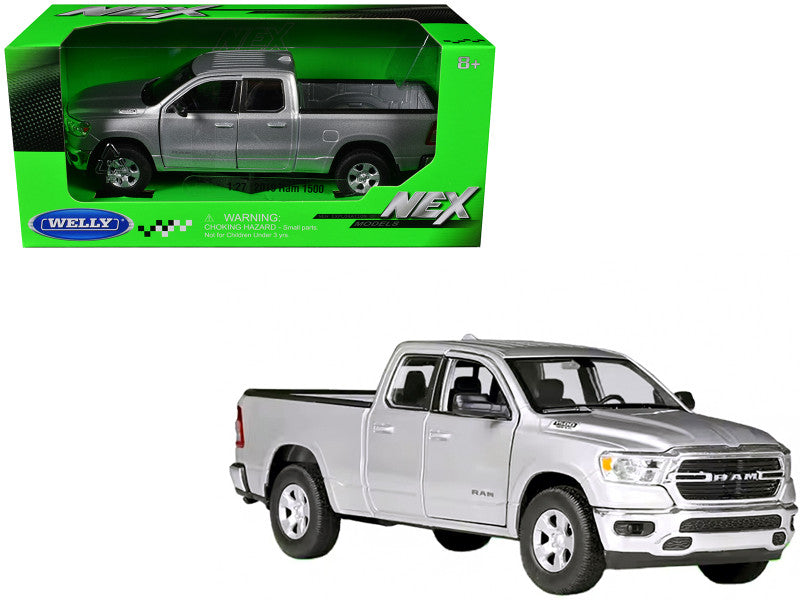 A silver 2019 Dodge Ram 1500 Pickup Truck diecast model car with its original packaging.