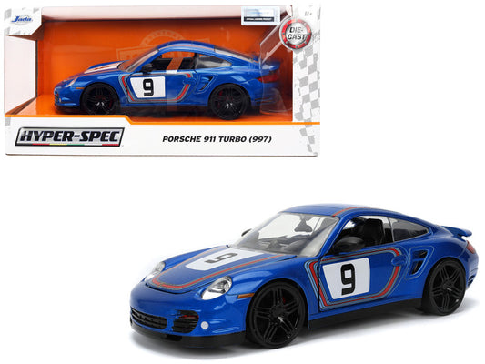 A blue diecast model of a Porsche 911 Turbo (997) with the number 9 on it, from the Hyper-Spec series by Jada, in packaging.