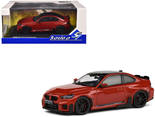 Red BMW model car with black details on a white background, featuring the Solido brand.