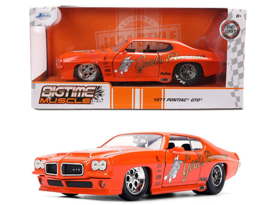 Orange die-cast car model in packaging with 'Eaglemoss' branding
