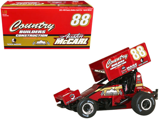 A diecast model of a Winged Sprint Car with the number 88 and 'Country Builders Construction' livery, along with the original packaging box.