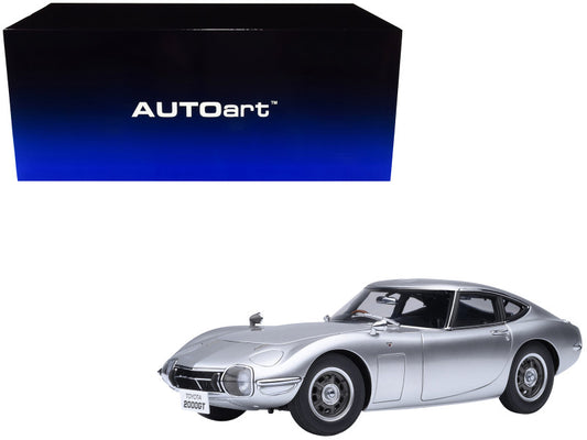 Model car of a classic Toyota 2000GT by AUTOart on a white background
