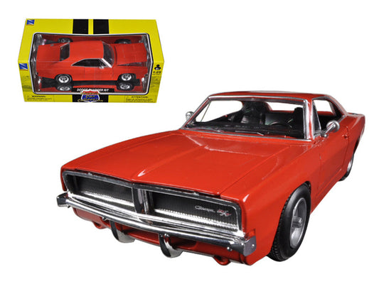 Red muscle car model with packaging on a white background