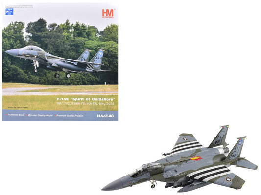 Model of F-15E 'Spirit of Goldsboro' with a scale model kit box in the background.