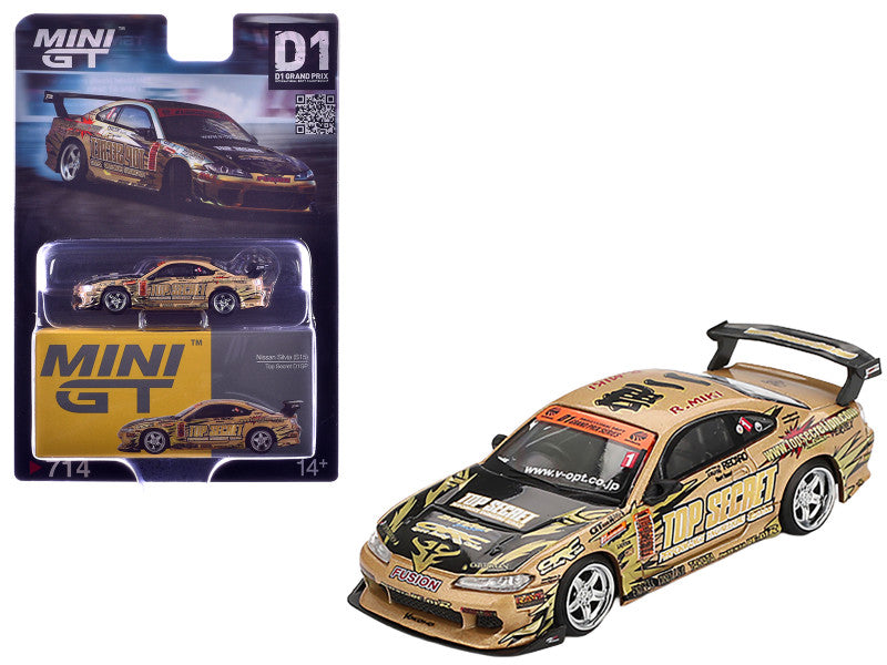 Gold and black toy car with 'MINI GT' branding on a white background
