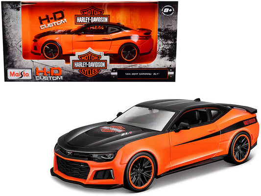 A 1:24 scale die cast model of a 2017 Chevrolet Camaro ZL1 in orange and black, with 'Harley Davidson' branding and 'H-D Custom' series details.